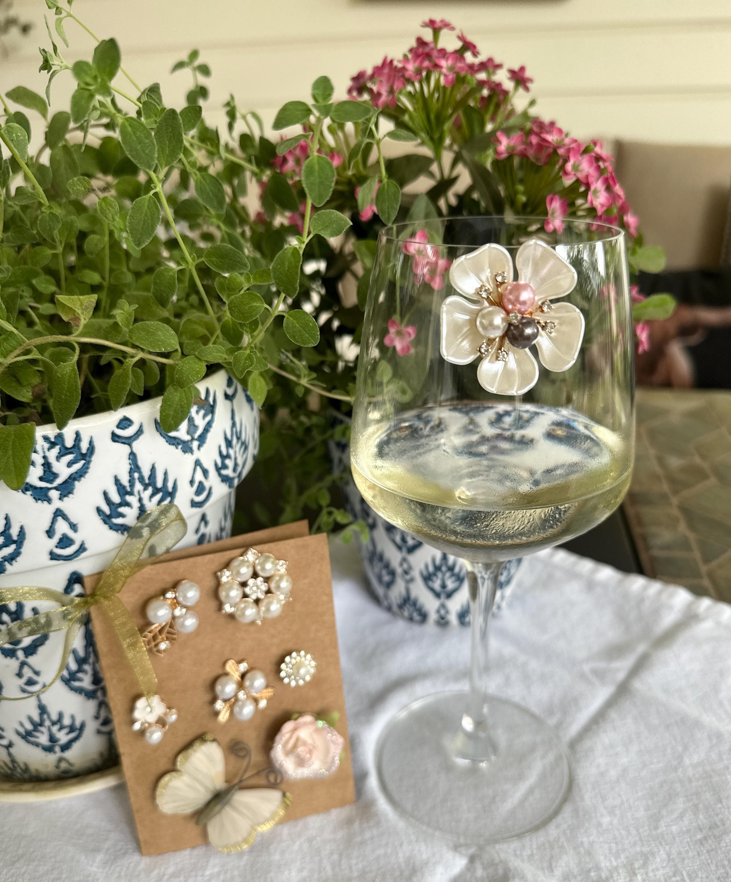 Floral Butterfly Wine Charms with Pearl Embellishments